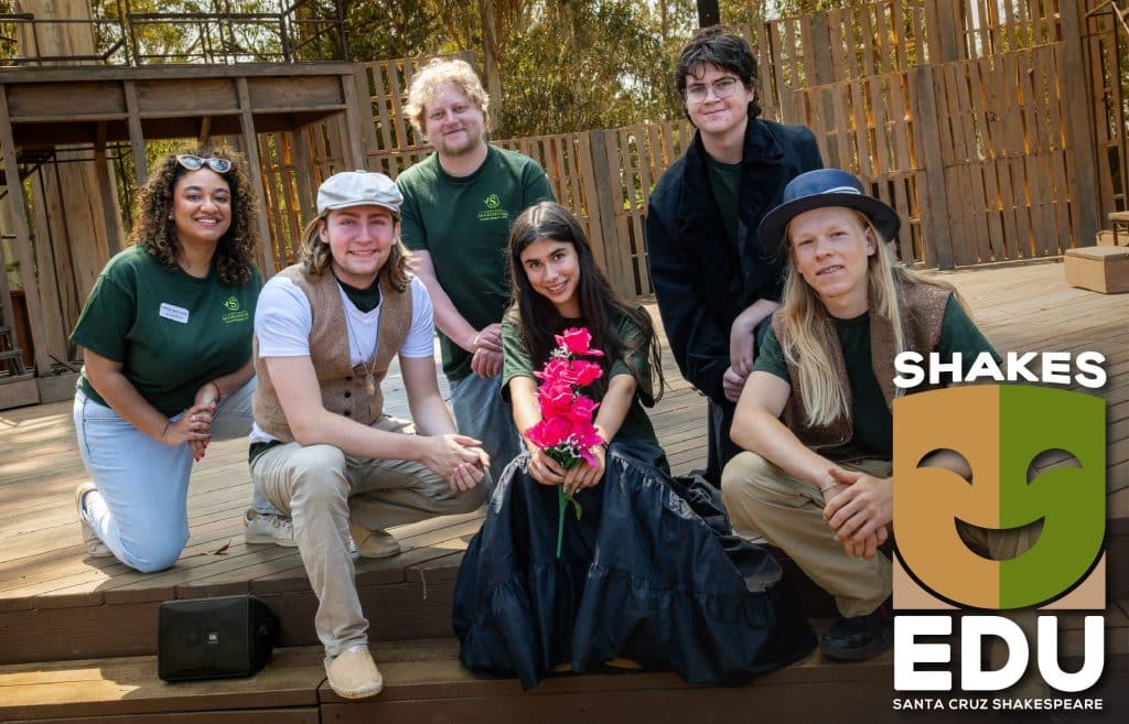 A group of kids with their Santa Cruz Shakespeare instructors and the Shakes EDU logo